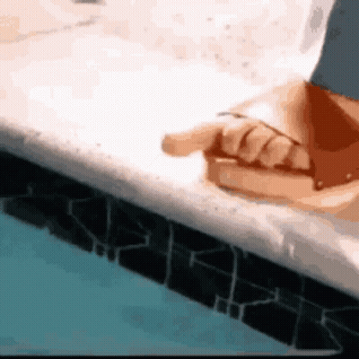 Hand Pointing At Swimming Pool GIF