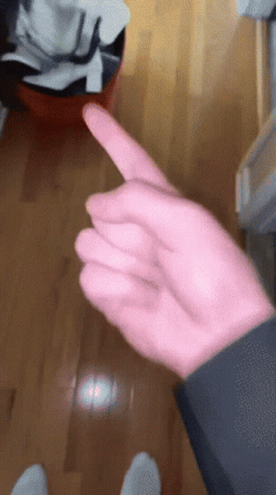 Hand Pointing to Trash Can