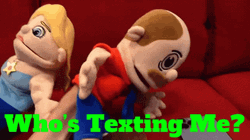 Hand Puppets Who's Texting Me GIF
