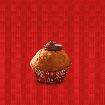 Hand Putting Raspberry On Cupcake GIF