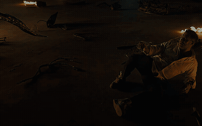 Hand Reaching Out In Front Of Building With Letter A GIF