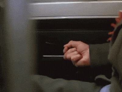 Hand Reaching Under Table GIF