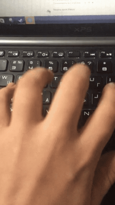 Hand Typing On XPS Laptop GIF