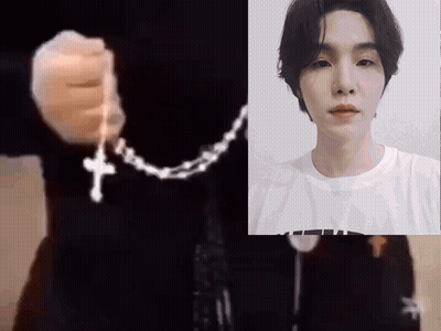 Hand With Cross Next To Face GIF