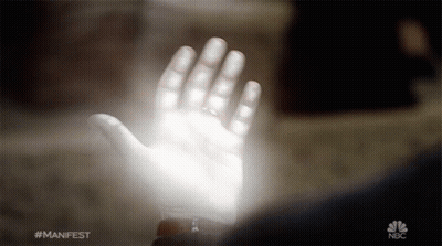 Hand With NBC Logo In Background GIF
