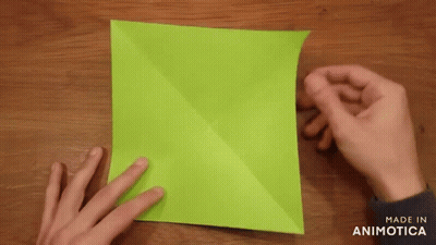 Hands Folding Green Paper Made In Animotica GIF
