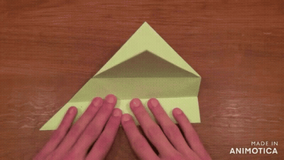 Hands Folding Green Paper With Made In Animotica GIF
