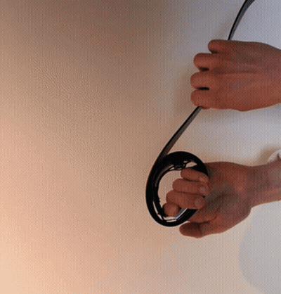Hands Holding Black Cord GIF