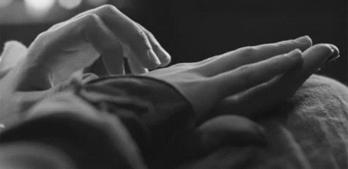 Hands Touching In Black And White GIF