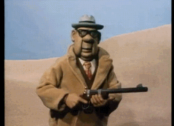 Hands Up Claymation In Desert GIF