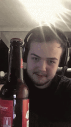 Happily Drinking Beer GIF