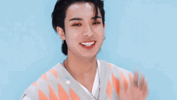 Happily Waving Hi GIF