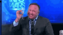 Happy Alex Jones Raising Wine Glass Cheers GIF