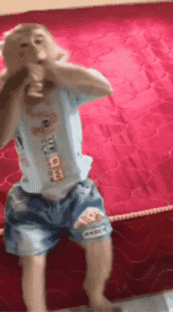 Happy Baby Monkey Playing Alone GIF