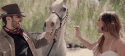 Happy Becky G Touching White Horse GIF