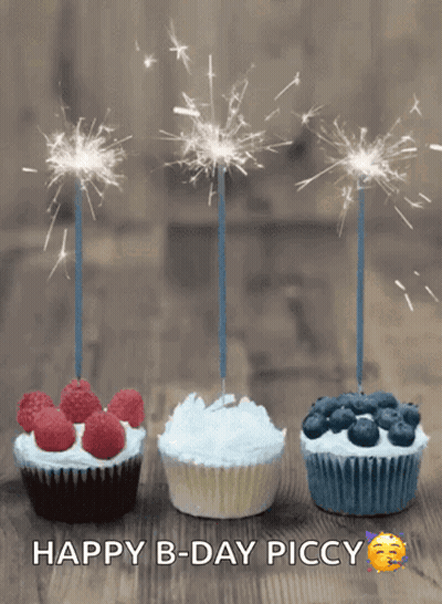 Happy Birthday Card With Three Cupcakes And Sparklers GIF