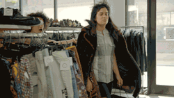 Happy Black Friday Women Walking With Shopping Bags GIF