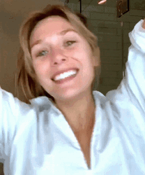 Happy Elizabeth Olsen Dancing Winking GIF