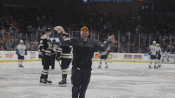 Happy Guy Running Holding A Squid GIF