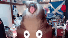 Happy Guy Wearing Poop Emoji Costume