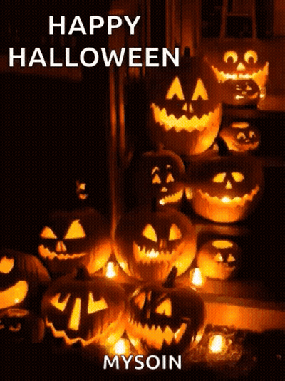 Happy Halloween Pumpkins With Carved Faces GIF