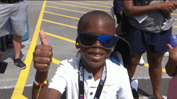 Happy Kid Thumbs Up On The Streets GIF