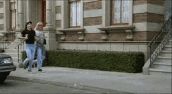 Happy Ladies Holding Hands Skipping GIF