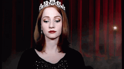 Happy Lady Clutching Pearls  GIF