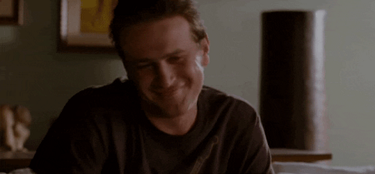 Happy Man Shrugs GIF