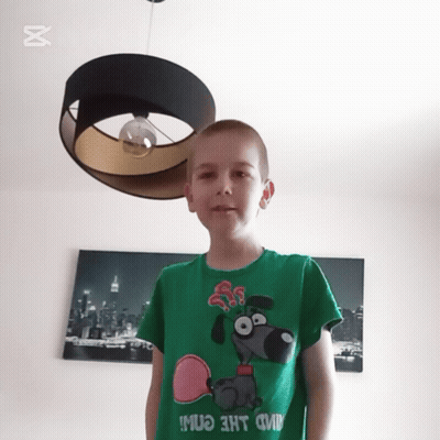 Happy New Year Boy Party Blowers GIF