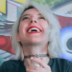 Happy Woman Saying Heaven GIF