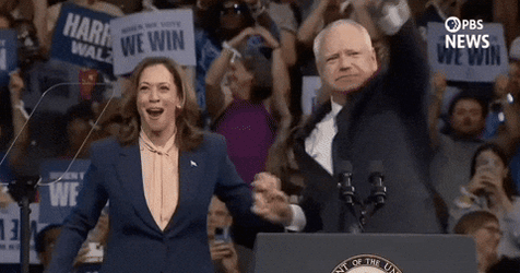 Harris Walz Laughing Raise Holding Hand GIF