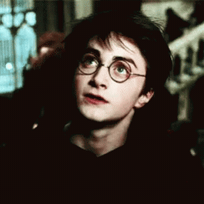 Harry Potter In Glasses And Black Shirt Making Funny Face GIF