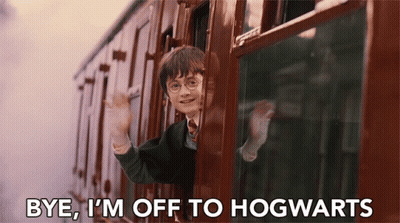 Harry Potter Is Waving From The Window Of A Train And Saying Bye I 'M Off To Hogwarts . GIF