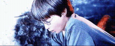 Harry Potter Is Wearing Glasses And A Blue Shirt In A Scene From Harry Potter And The Philosopher 'S Stone . GIF