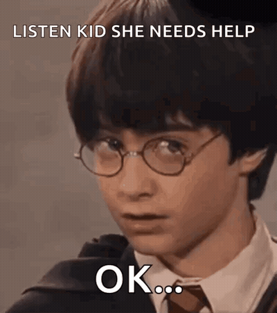 Harry Potter Is Wearing Glasses And A Suit And Tie And Making A Funny Face . GIF