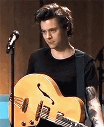 Harry Styles Kissing Guitar