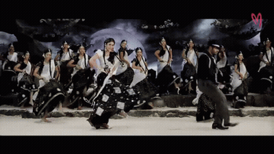 Hat Man Dancing With Women In Black White GIF