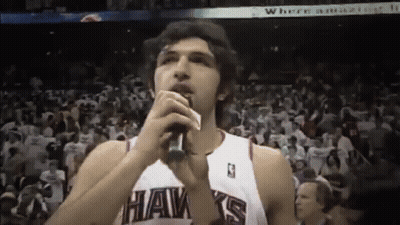 Hawks Player Singing Into Microphone GIF