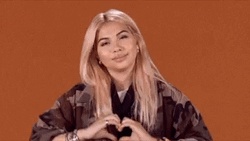 Hayley Kiyoko Giving Heart Hand GIF