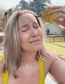 Head Tap Woman Holding Small Crown GIF