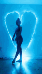 Heart Shape Led Light Behind The Gymnastic GIF