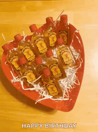 Heart Shaped Bowl With Fireball Liquor Bottles GIF