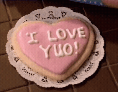 Heart Shaped Cookie Saying I Love Yuo GIF