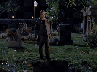 Heart Shaped Gravestone In Cemetery GIF