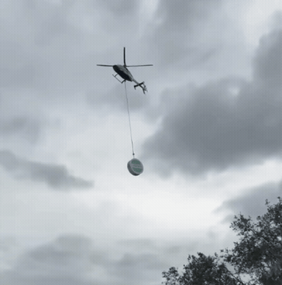 Helicopter Carrying Sign Saying A