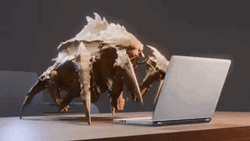 Helldivers 2 Warrior Typing On A Laptop GIF