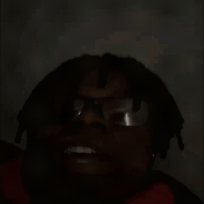 Hennessy Bottle On Couch Beside Man With Glasses GIF