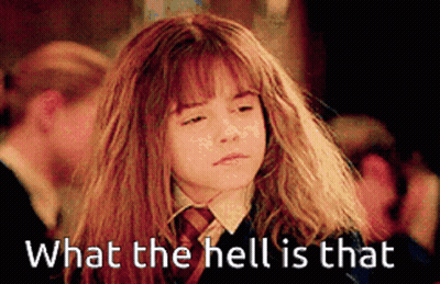 Hermione Granger From Harry Potter Is Making A Funny Face With The Words " What The Hell Is That " Below Her GIF