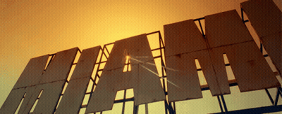 Hi-Way Sign Against Sunset Sky GIF
